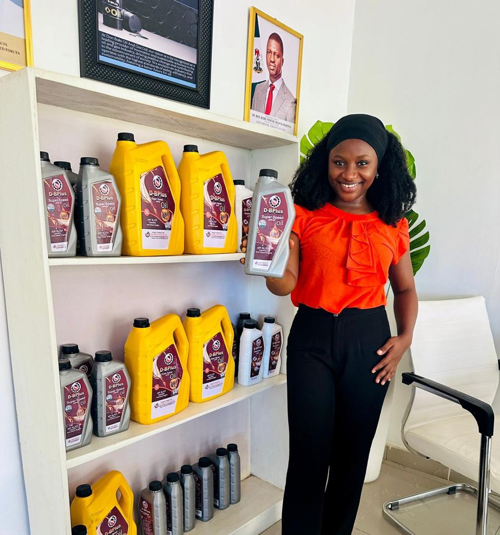 Staff member showcasing D-BPlus products in the company showroom