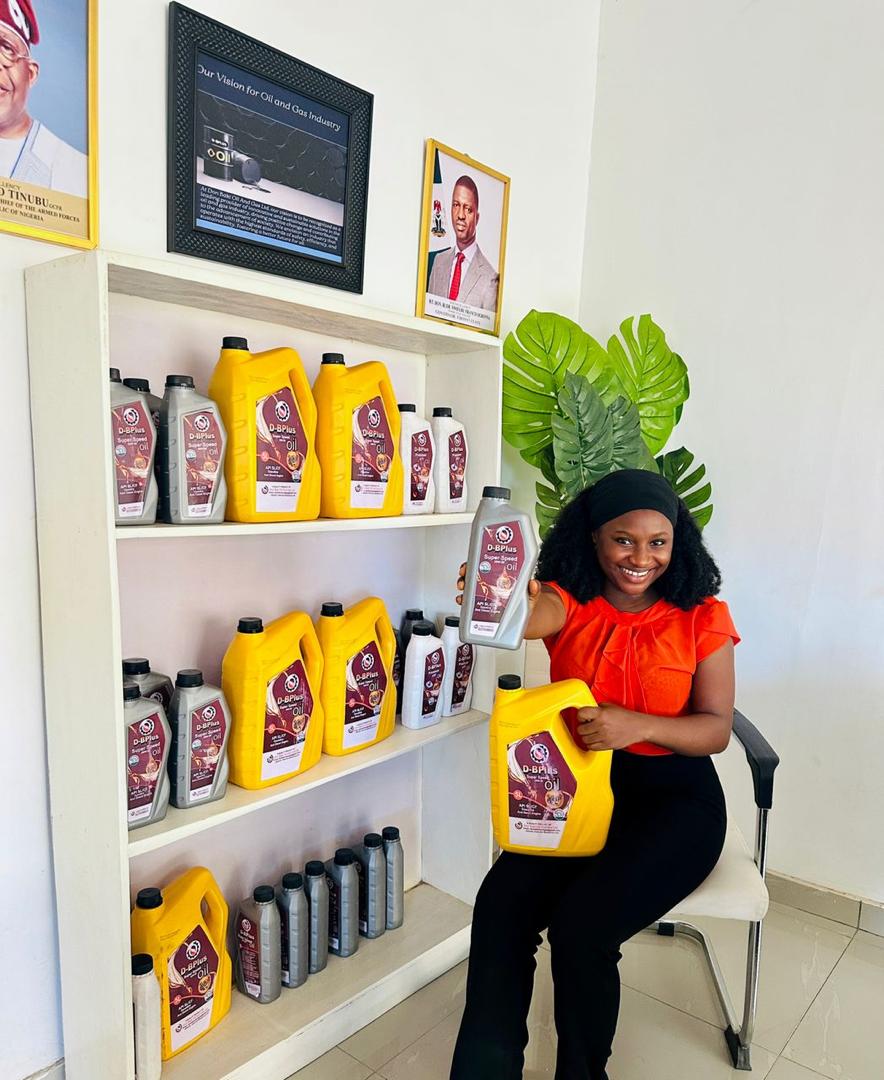 Staff member with D-BPlus products in company showroom